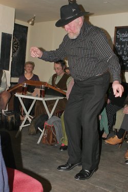Richard Davies stepping in the Vernon Arms, Southrepps, in March 2008 (at a Rig-a-Jig-Jig event in the pub).